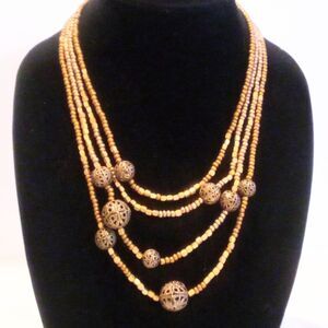 Brass Bead Accented Gold Beaded Multi Strand Necklace *